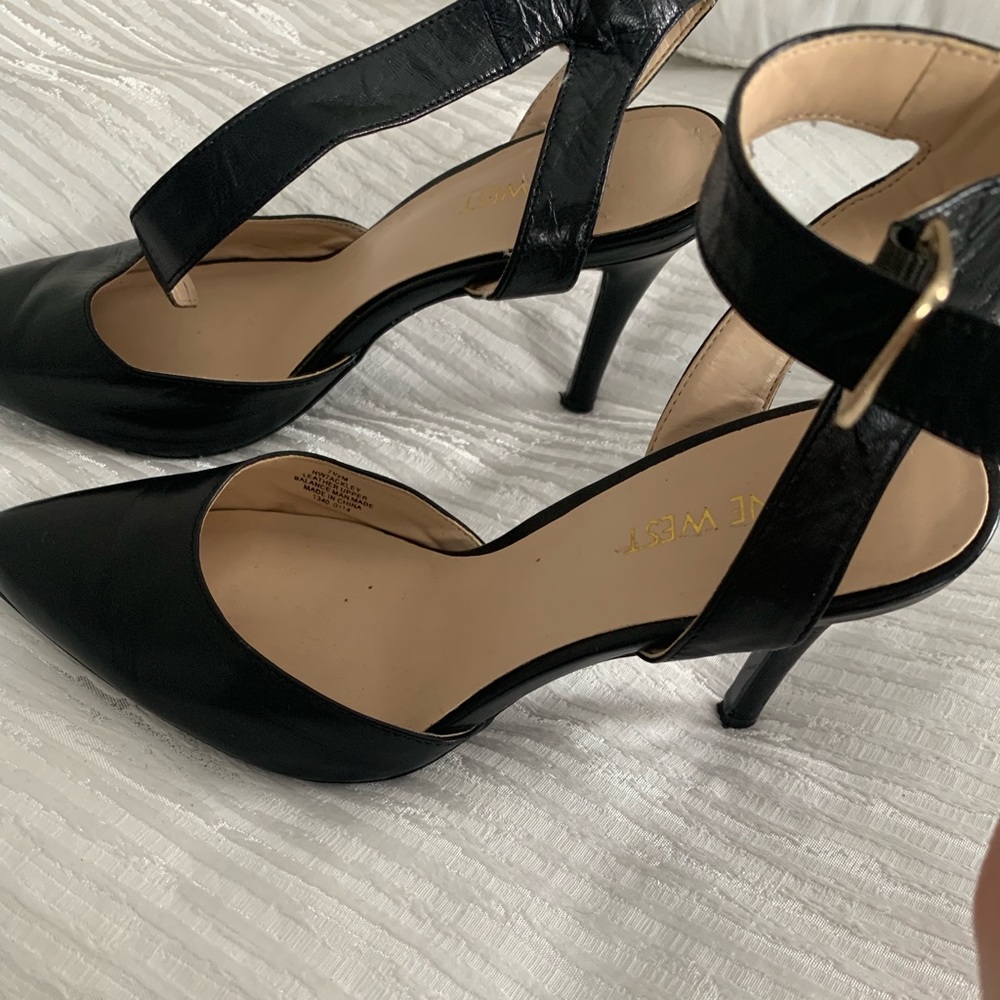 Black leather pumps